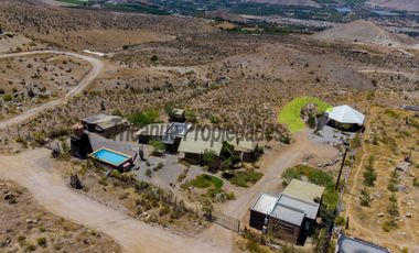 Venta de hermosa parcela de 10.000 m2, con 3 cabañas, agua de riego. Sector Mamalluca, Vicuña. $180 millones.