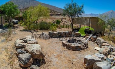 Venta de hermosa parcela de 10.000 m2, con 3 cabañas, agua de riego. Sector Mamalluca, Vicuña. $180 millones.
