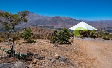 Venta de hermosa parcela de 10.000 m2, con 3 cabañas, agua de riego. Sector Mamalluca, Vicuña. $180 millones.