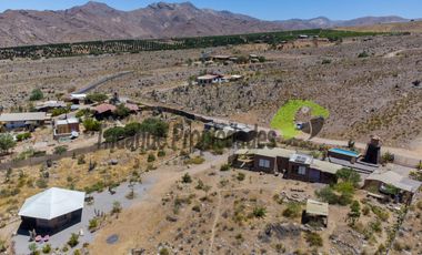 Venta de hermosa parcela de 10.000 m2, con 3 cabañas, agua de riego. Sector Mamalluca, Vicuña. $180 millones.