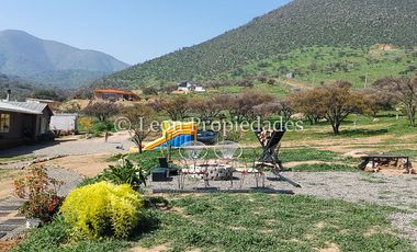Leon Propiedades vende parcela con casa en Fundo Alhué, Curacaví.