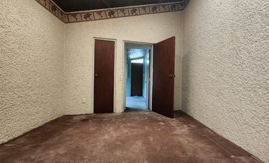 Casa rodeada de jardines