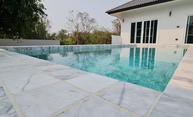 Discover Modern Luxury: Poolside Spa Villa Now for Sale!