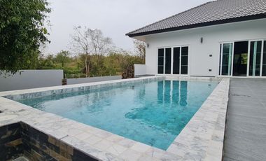 Discover Modern Luxury: Poolside Spa Villa Now for Sale!
