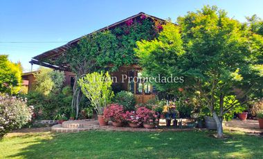 Leon Propiedades vende Parcela con 3 casas en sector Los Naranjos, Curacaví.