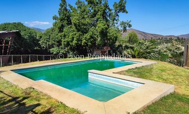 Leon Propiedades vende Parcela con 3 casas en sector Los Naranjos, Curacaví.