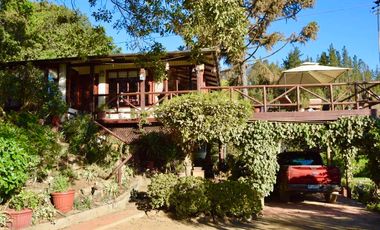 EXTRANJERO POR VIAJE VENDE CASA FRENTE A LAGUNA TORCA - MARAVILLOSO TERRENO