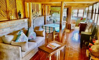 EXTRANJERO POR VIAJE VENDE CASA FRENTE A LAGUNA TORCA - MARAVILLOSO TERRENO