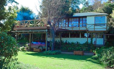 EXTRANJERO POR VIAJE VENDE CASA FRENTE A LAGUNA TORCA - MARAVILLOSO TERRENO