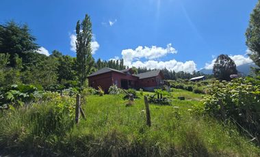 Se vende parcela con casa y  vista al lago en Futrono