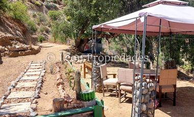 Leon Propiedades vende parcela de 9700m2 con casa en sector Miraflores, Curacaví.