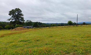 Hermosa Parcela con Casa vista volcán y valle de Villarrica.