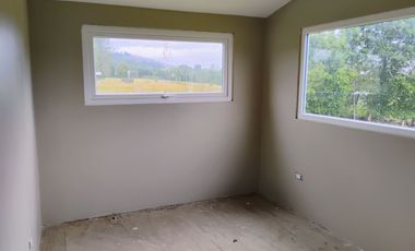 Hermosa Parcela con Casa vista volcán y valle de Villarrica.