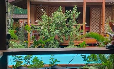 Operating bed and breakfast with lot of greens in the heart of Puerto Princesa, Palawan
