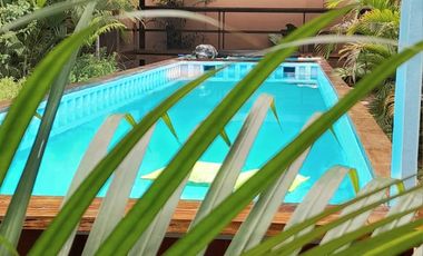 Operating bed and breakfast with lot of greens in the heart of Puerto Princesa, Palawan
