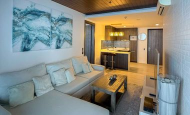 BARGAIN (OPTION TO RENT 110K + dues)!! 25.5m PHP net of All taxes SENSATIONAL PANORAMIC FULLY FURNISHED Two bedroom UNIT at The Reef Condominium