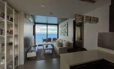 BARGAIN (OPTION TO RENT 110K + dues)!! 25.5m PHP net of All taxes SENSATIONAL PANORAMIC FULLY FURNISHED Two bedroom UNIT at The Reef Condominium