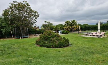 HERMOSA PARCELA PLANA CON CASA UN EXCLUSIVO CONDOMINIO