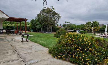 HERMOSA PARCELA PLANA CON CASA UN EXCLUSIVO CONDOMINIO