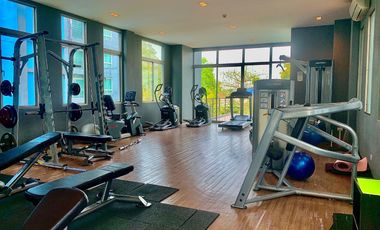 Spacious condo at an unbeatable price, well below market value! Rill Condo Rangsit – Prime location on Kamphaeng Phet Road, near Rangsit University!
