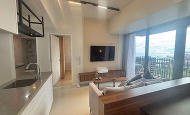 FOR RENT - MODERN, LARGE 1BR WITH SEAVIEW BALCONY IN MANDANI BAY, CEBU. INTERIOR DESIGNED UNIT.