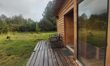 CASA CERCANA A LAGO RANCO.