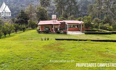 FINCA CON BOSQUE Y RÍO DE 25 HECTÁREAS