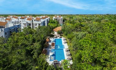 Departamento en venta en Puerto Morelos con Albercas, Gimnasio y Seguridad