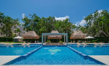 Departamento en venta en Puerto Morelos con Albercas, Gimnasio y Seguridad