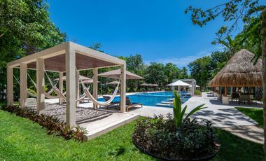 Departamento en venta en Puerto Morelos con Albercas, Gimnasio y Seguridad