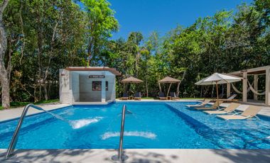 Departamento en venta en Puerto Morelos con Albercas, Gimnasio y Seguridad