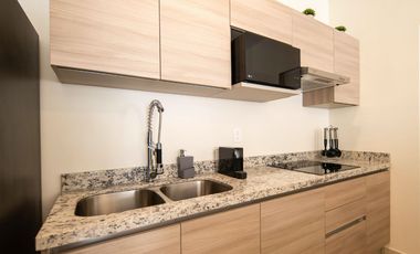Departamento en venta en Puerto Morelos con Albercas, Gimnasio y Seguridad