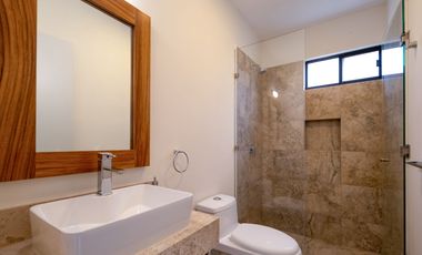 Departamento en venta en Puerto Morelos con Albercas, Gimnasio y Seguridad