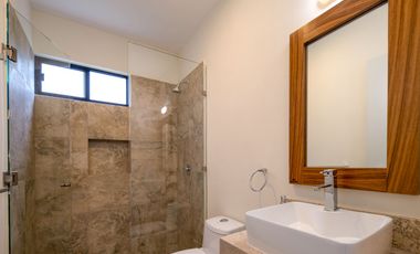 Departamento en venta en Puerto Morelos con Albercas, Gimnasio y Seguridad