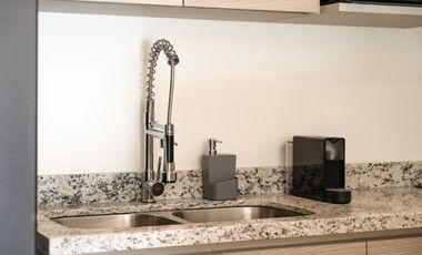 Departamento en venta en Puerto Morelos con Albercas, Gimnasio y Seguridad