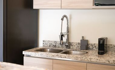 Departamento en venta en Puerto Morelos con Albercas, Gimnasio y Seguridad