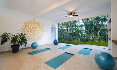 Departamento en venta en Puerto Morelos con Albercas, Gimnasio y Seguridad