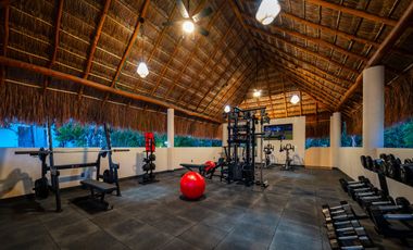 Departamento en venta en Puerto Morelos con Albercas, Gimnasio y Seguridad