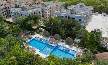 Departamento en venta en Puerto Morelos con Albercas, Gimnasio y Seguridad