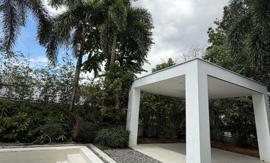 Dasmariñas Village is an exclusive, high-end gated community in Makati City, Philippines. It is known for its luxury homes, tree-lined streets, and ti