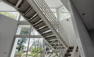 Dasmariñas Village is an exclusive, high-end gated community in Makati City, Philippines. It is known for its luxury homes, tree-lined streets, and ti