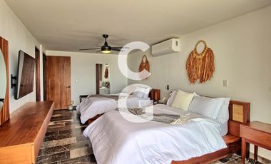 Casa en Venta en Puerto Morelos en Bahía Petempich Frente al Mar con 7 Rec