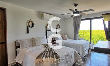 Casa en Venta en Puerto Morelos en Bahía Petempich Frente al Mar con 7 Rec