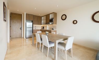 Departamento de lujo con vistas al mar y montañas, frente a playa. Amenidades exclusivas y servicio de resort para una experiencia única