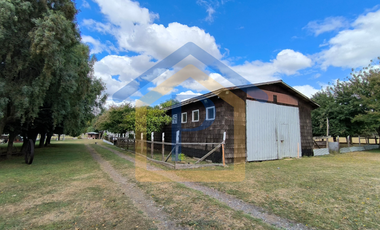 Hermoso campo de 1,25 hectáreas con casa de madera nativa y árboles frutales en Casma, Frutillar