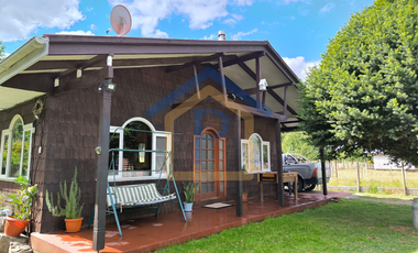 Hermoso campo de 1,25 hectáreas con casa de madera nativa y árboles frutales en Casma, Frutillar