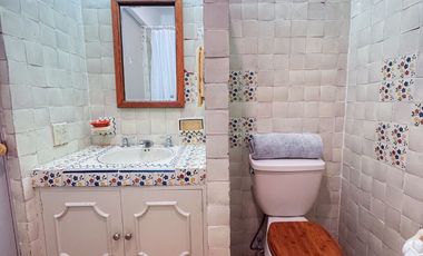 Elegancia y Confort en una Casa de 3 Niveles Cerca de la Playa