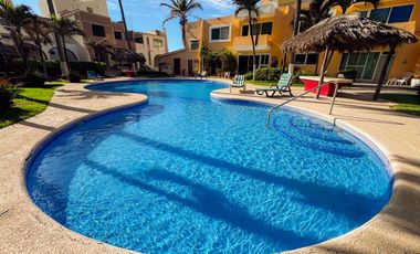 Elegancia y Confort en una Casa de 3 Niveles Cerca de la Playa