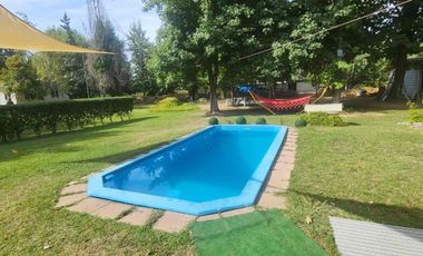 Venta parcela con Casas y plantación de arandanos