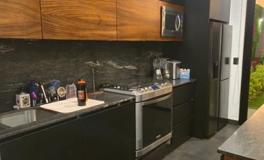 Venta de Loft con acabados Luxury, como parota, mármol, granito, cristal templado, laja con un diseño moderno, en el Fraccionamiento Lomas del Sur.